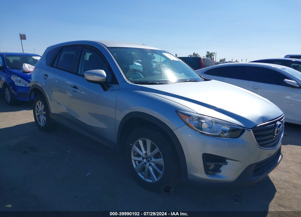 2016 MAZDA CX-5 TOURING VIN: JM3KE2CY4G0909612