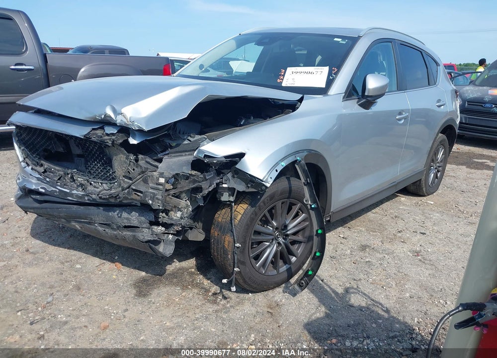 2021 MAZDA CX-5 TOURING VIN: JM3KFBCMXM1402956