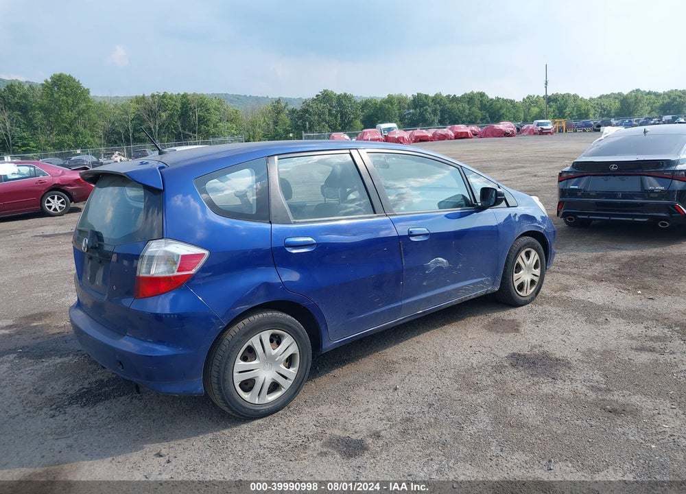 2009 HONDA FIT VIN: JHMGE88209S026926