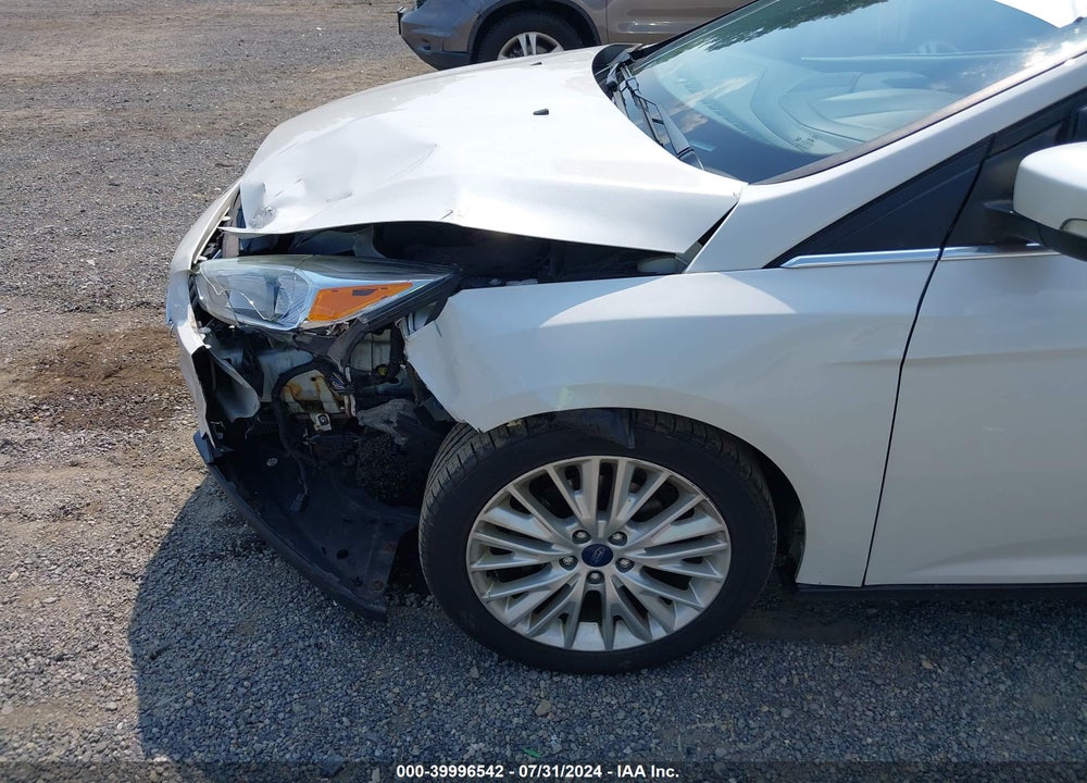 2017 FORD FOCUS TITANIUM VIN: 1FADP3J29HL253106