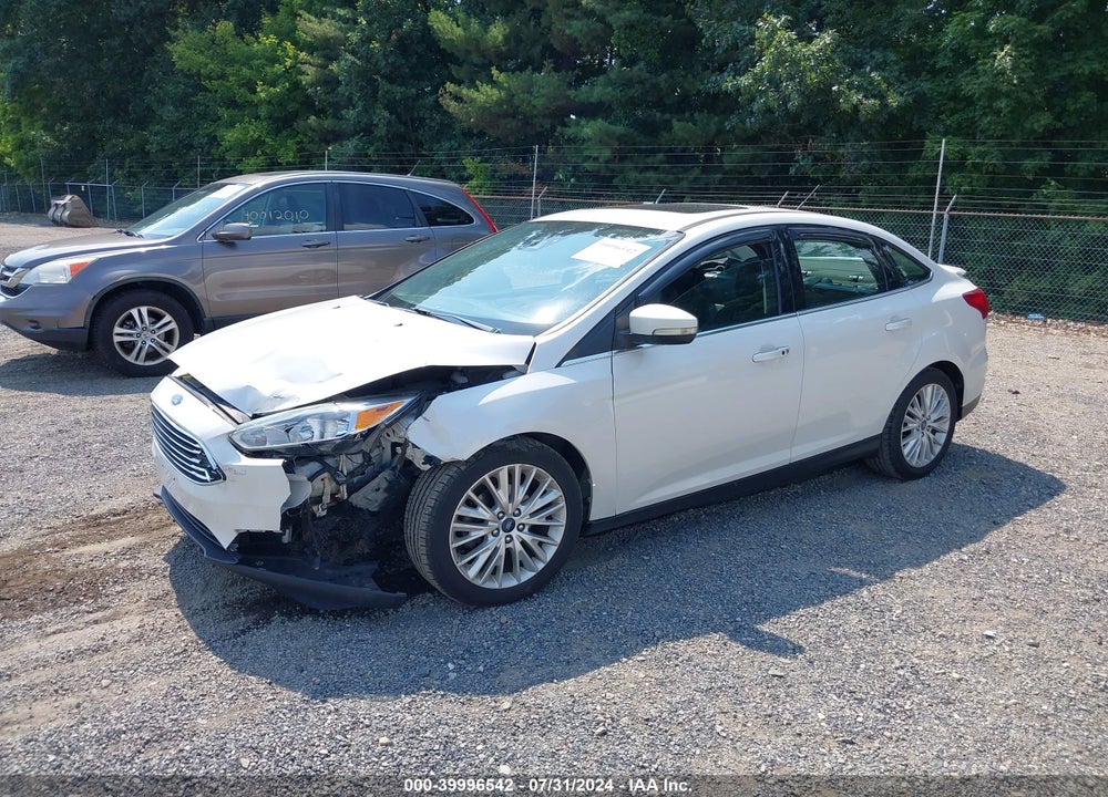 2017 FORD FOCUS TITANIUM VIN: 1FADP3J29HL253106