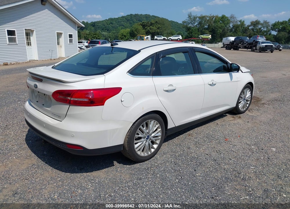 2017 FORD FOCUS TITANIUM VIN: 1FADP3J29HL253106