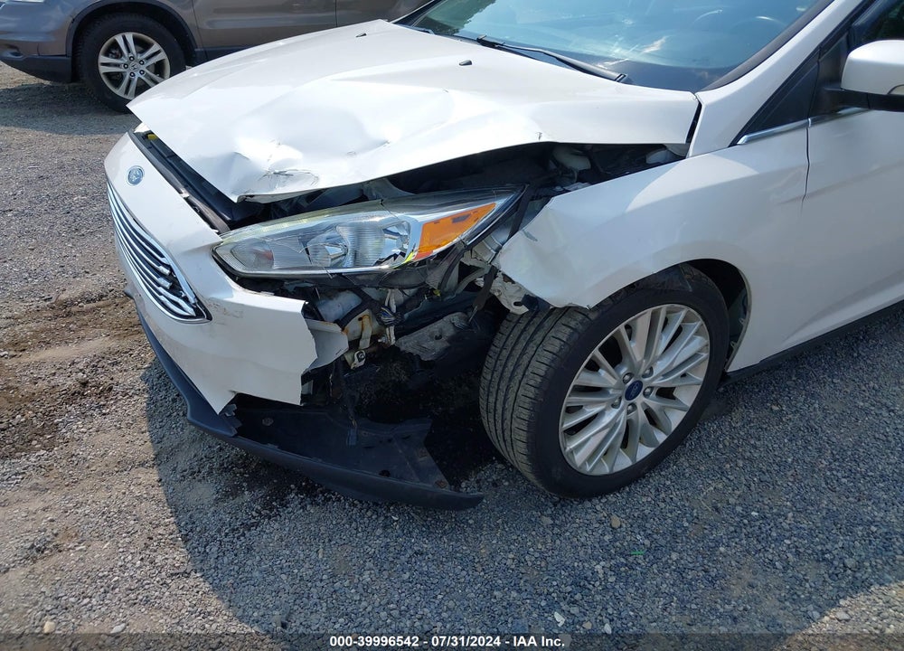 2017 FORD FOCUS TITANIUM VIN: 1FADP3J29HL253106