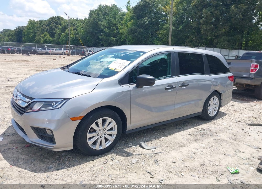 2018 HONDA ODYSSEY LX VIN: 5FNRL6H2XJB051421