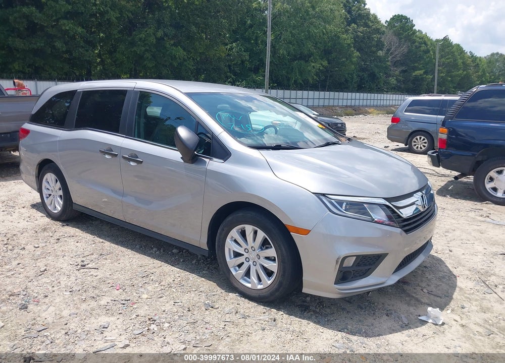 2018 HONDA ODYSSEY LX VIN: 5FNRL6H2XJB051421
