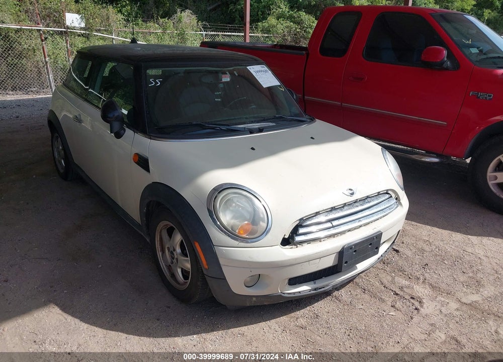 2009 MINI COOPER VIN: WMWMF33559TW70046