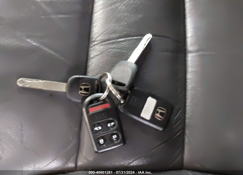 2007 HONDA ODYSSEY EX-L VIN: 5FNRL387X7B017000