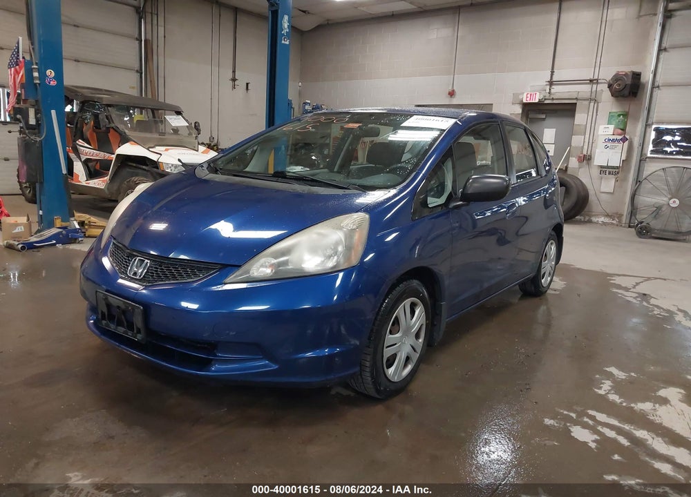 2010 HONDA FIT VIN: JHMGE8H28AC017552