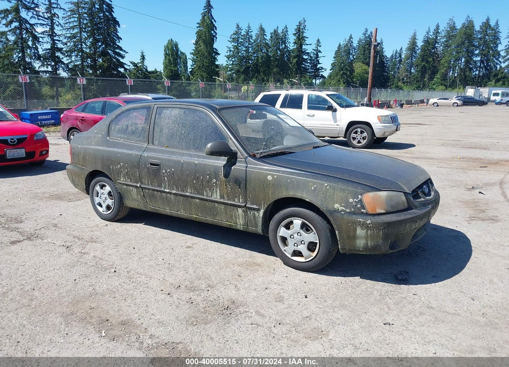 2002 HYUNDAI ACCENT L VIN: KMHCF35G92U206993