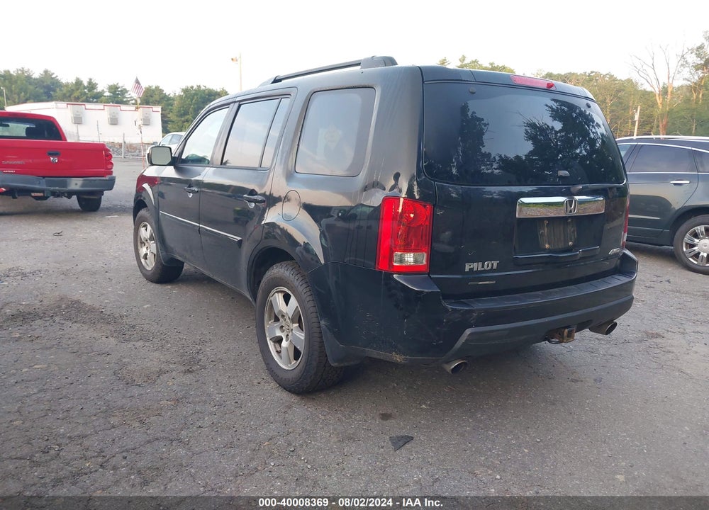 2011 HONDA PILOT EX-L VIN: 5FNYF4H51BB034042