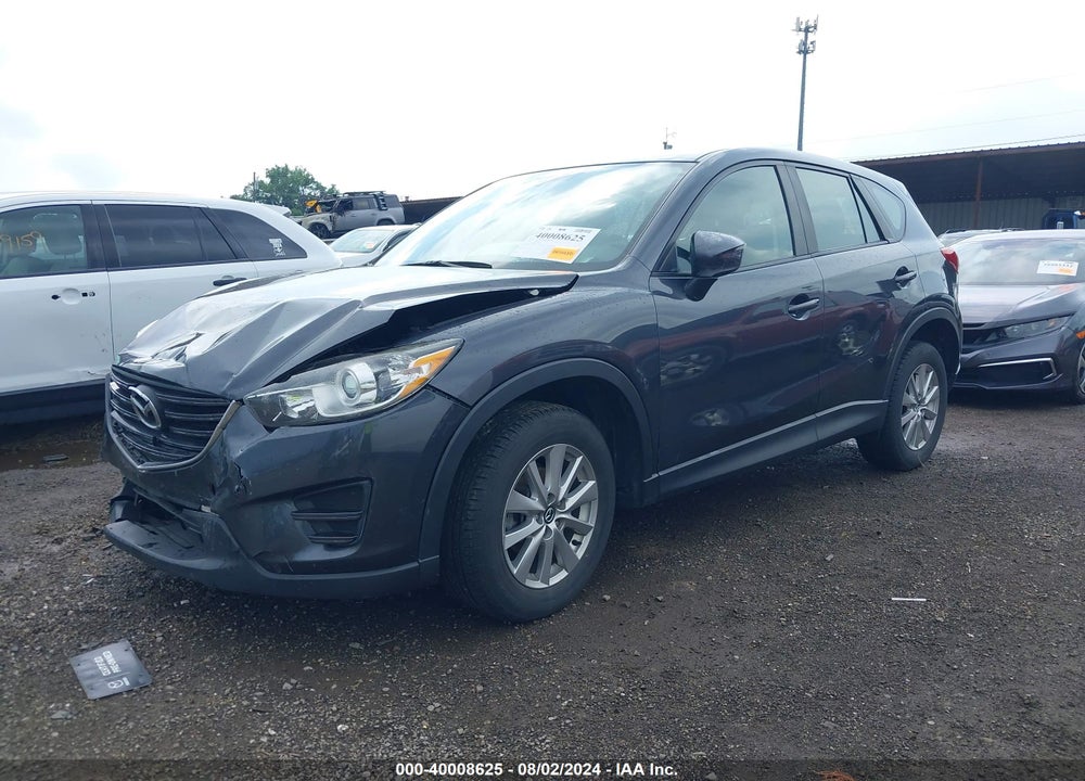 2016 MAZDA CX-5 SPORT VIN: JM3KE2BY9G0784639