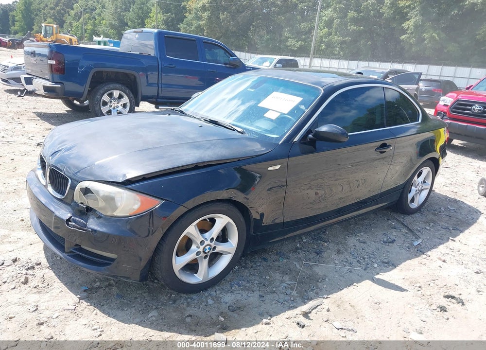 2009 BMW 128I VIN: WBAUP73509VK74907