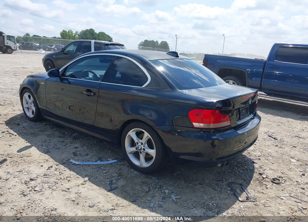 2009 BMW 128I VIN: WBAUP73509VK74907