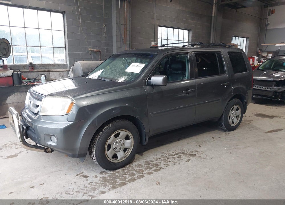 2011 HONDA PILOT EX-L VIN: 5FNYF4H77BB022429