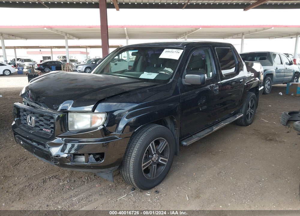2012 HONDA RIDGELINE SPORT VIN: 5FPYK1F7XCB451098