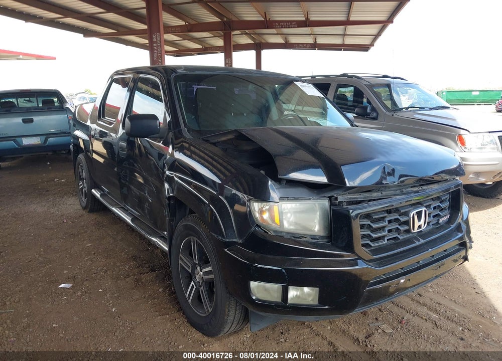 2012 HONDA RIDGELINE SPORT VIN: 5FPYK1F7XCB451098