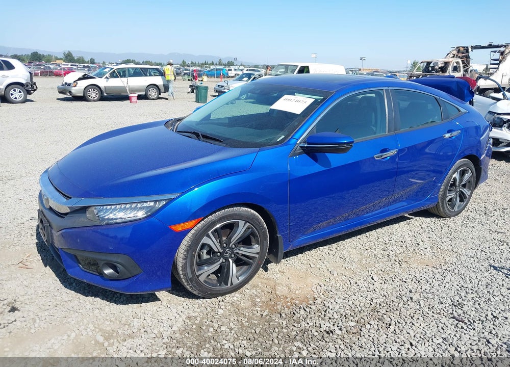 2016 HONDA CIVIC TOURING VIN: 19XFC1F90GE223492