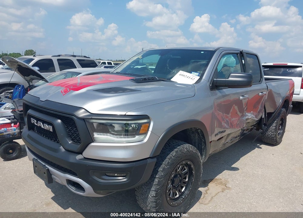 2019 RAM 1500 REBEL QUAD CAB 4X4 6'4 BOX VIN: 1C6RRFEG0KN820310