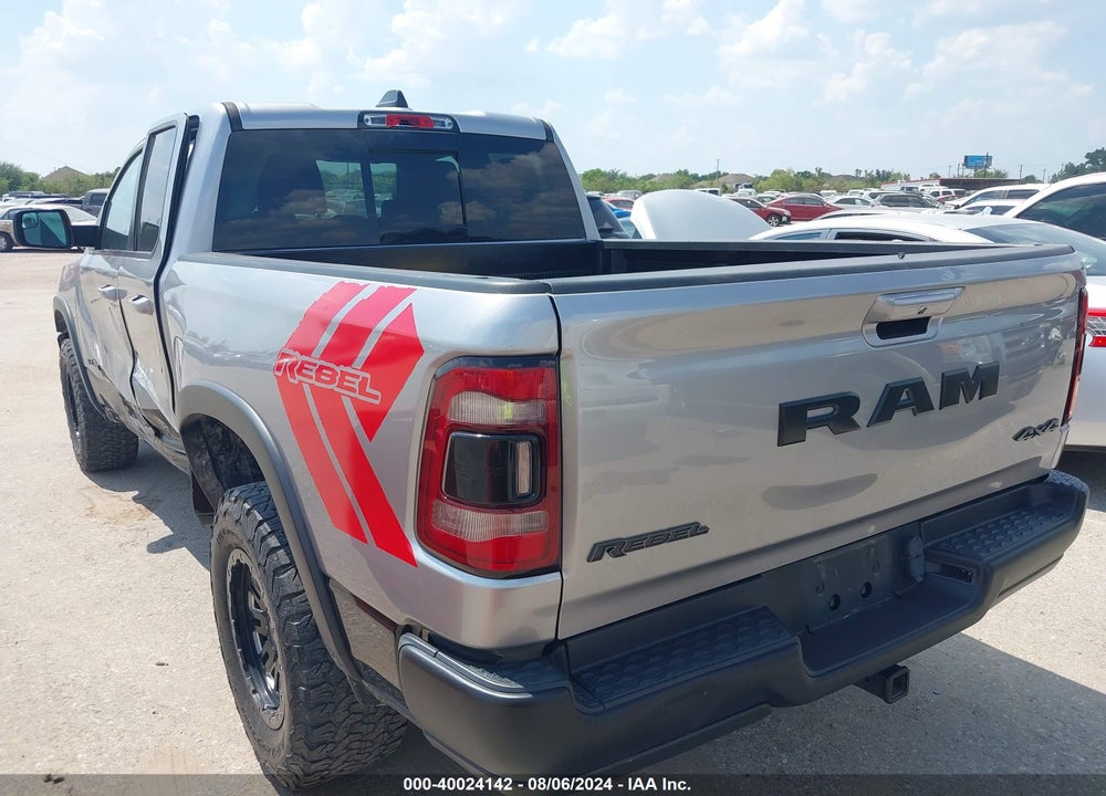 2019 RAM 1500 REBEL QUAD CAB 4X4 6'4 BOX VIN: 1C6RRFEG0KN820310