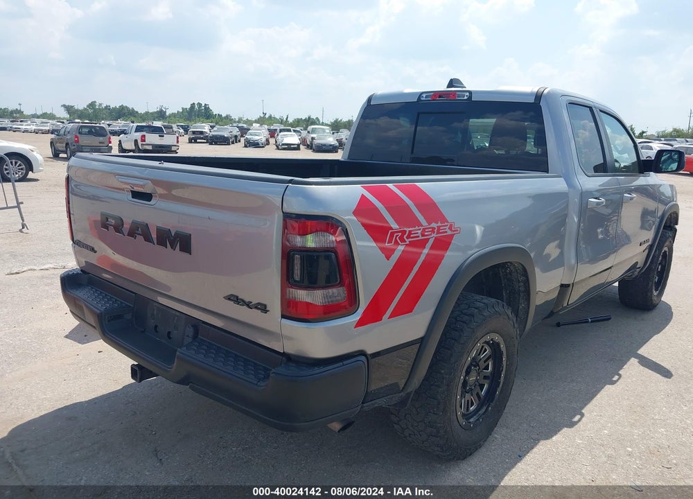 2019 RAM 1500 REBEL QUAD CAB 4X4 6'4 BOX VIN: 1C6RRFEG0KN820310