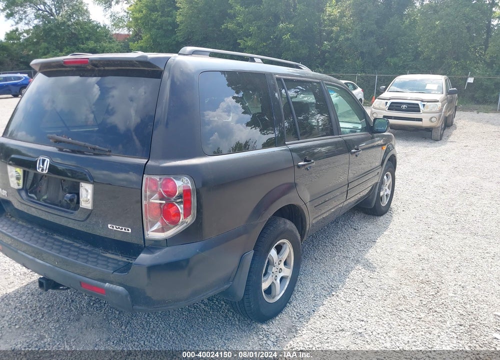 2007 HONDA PILOT EX-L VIN: 2HKYF18717H525705