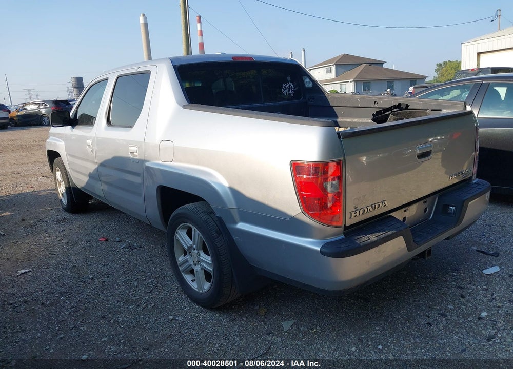2011 HONDA RIDGELINE RTL VIN: 5FPYK1F56BB451631