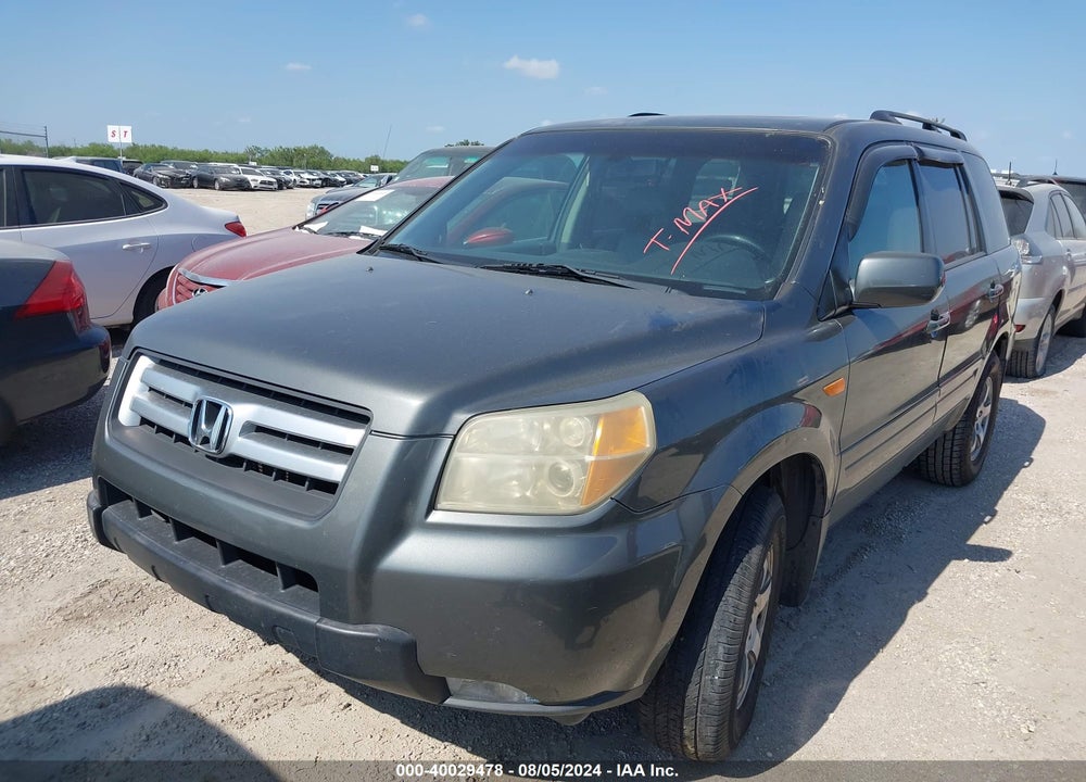 2007 HONDA PILOT EX-L VIN: 5FNYF28697B037629