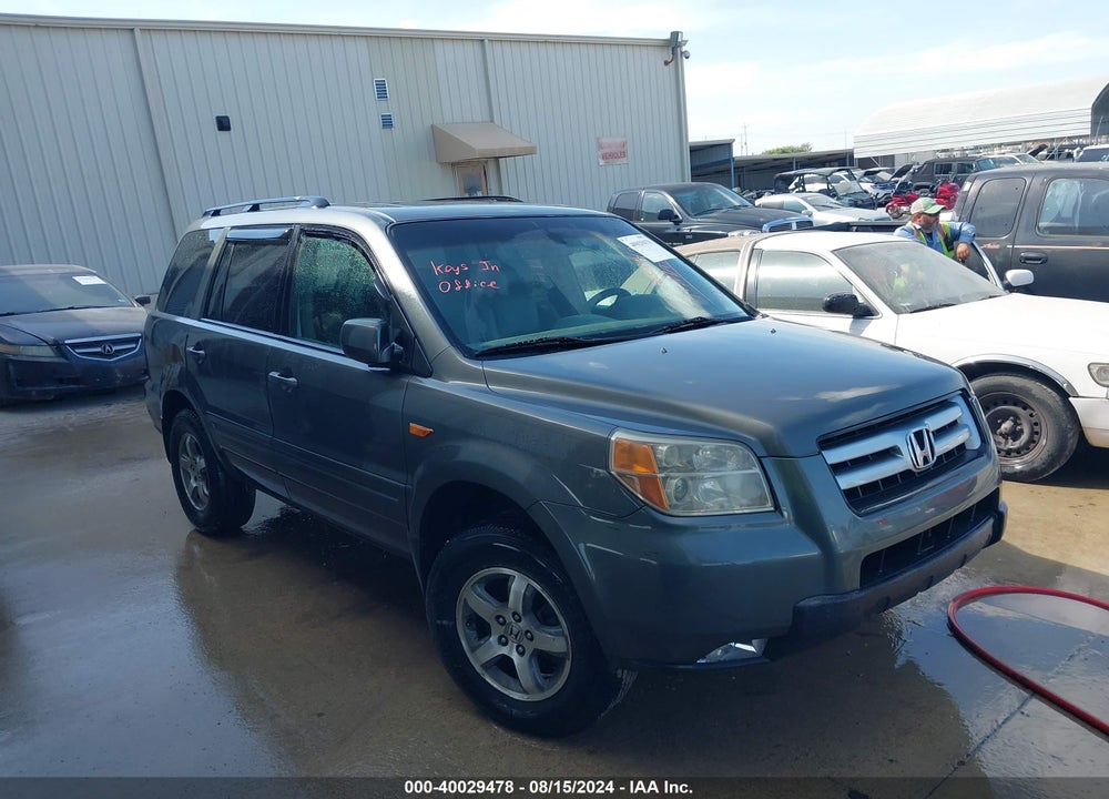 2007 HONDA PILOT EX-L VIN: 5FNYF28697B037629