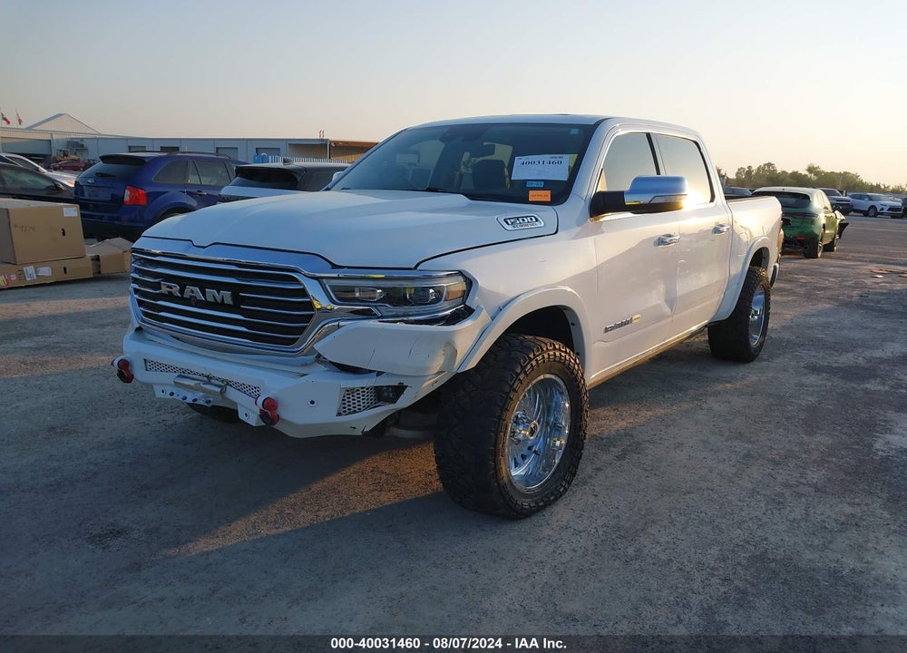 2021 RAM 1500 LIMITED LONGHORN 4X4 5'7 BOX VIN: 1C6SRFKM5MN780773