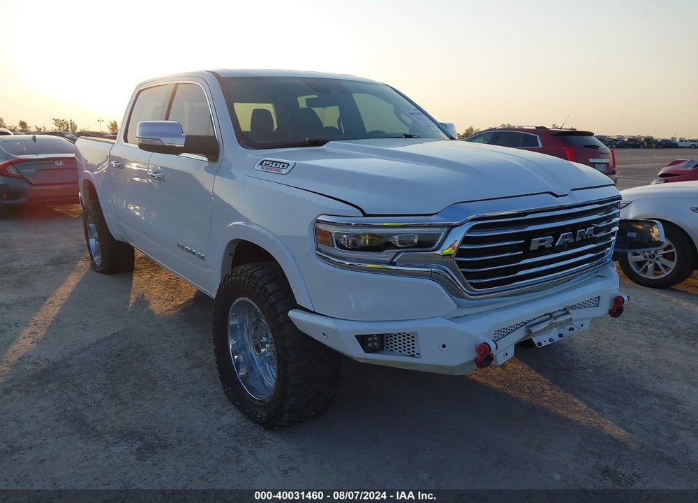 2021 RAM 1500 LIMITED LONGHORN 4X4 5'7 BOX VIN: 1C6SRFKM5MN780773