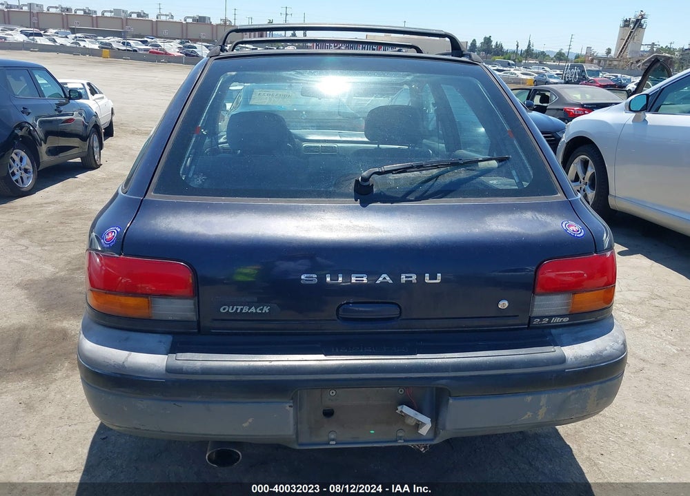 1996 SUBARU IMPREZA OUTBACK VIN: JF1GF4850TH814620