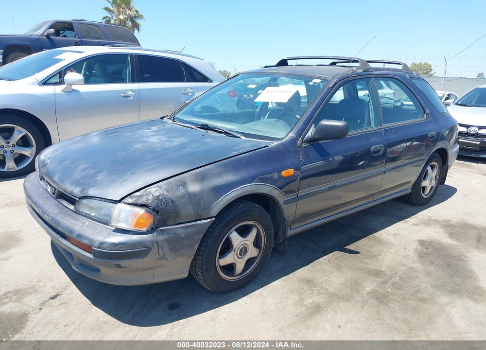 1996 SUBARU IMPREZA OUTBACK VIN: JF1GF4850TH814620