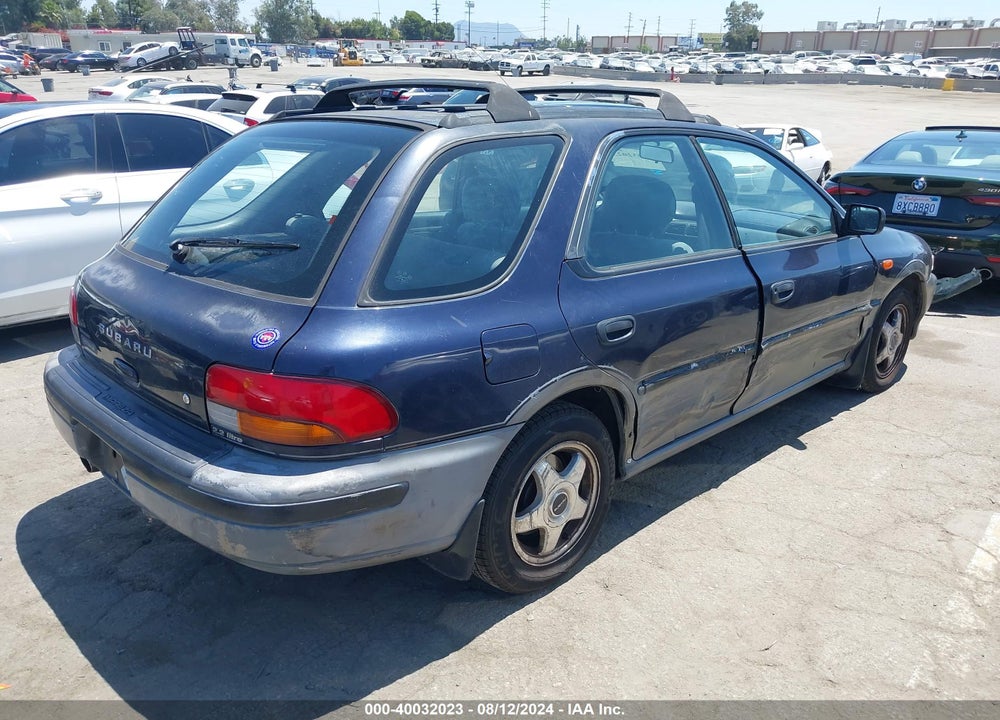 1996 SUBARU IMPREZA OUTBACK VIN: JF1GF4850TH814620