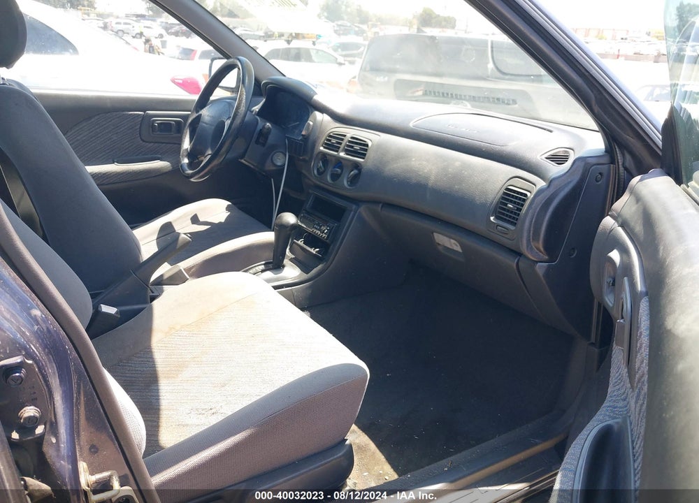 1996 SUBARU IMPREZA OUTBACK VIN: JF1GF4850TH814620