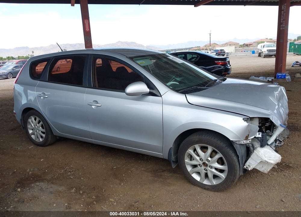 2009 HYUNDAI ELANTRA TOURING VIN: KMHDC86E49U025477