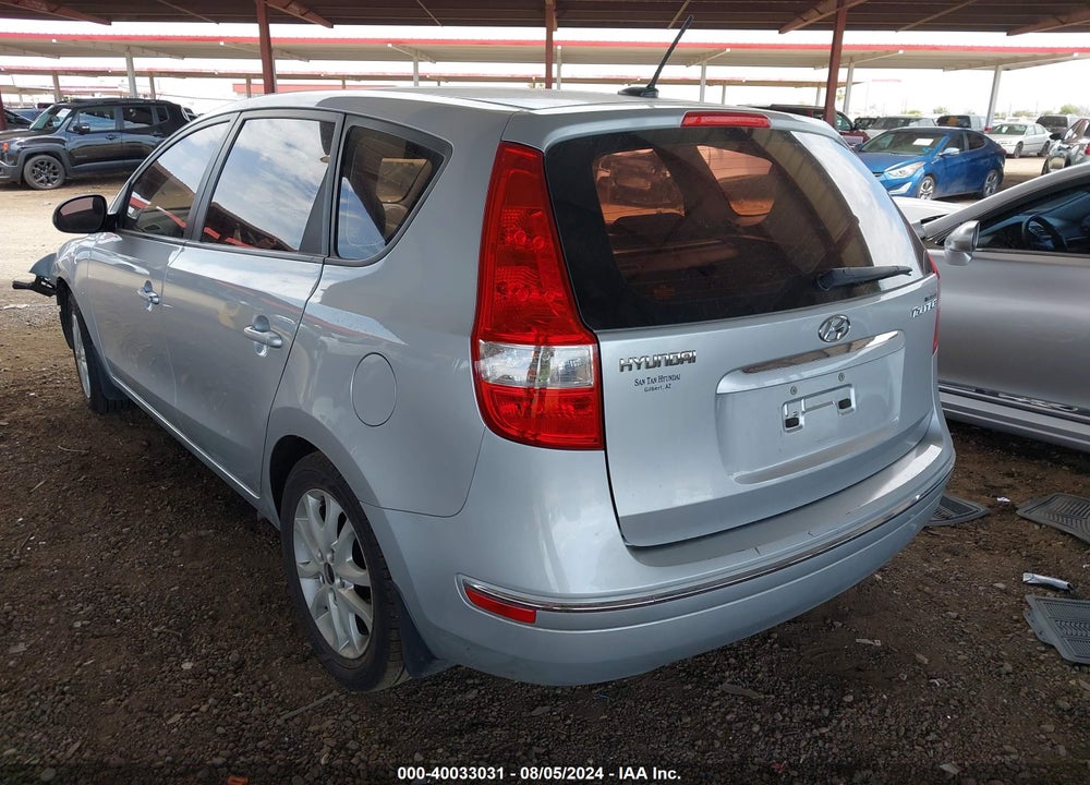 2009 HYUNDAI ELANTRA TOURING VIN: KMHDC86E49U025477