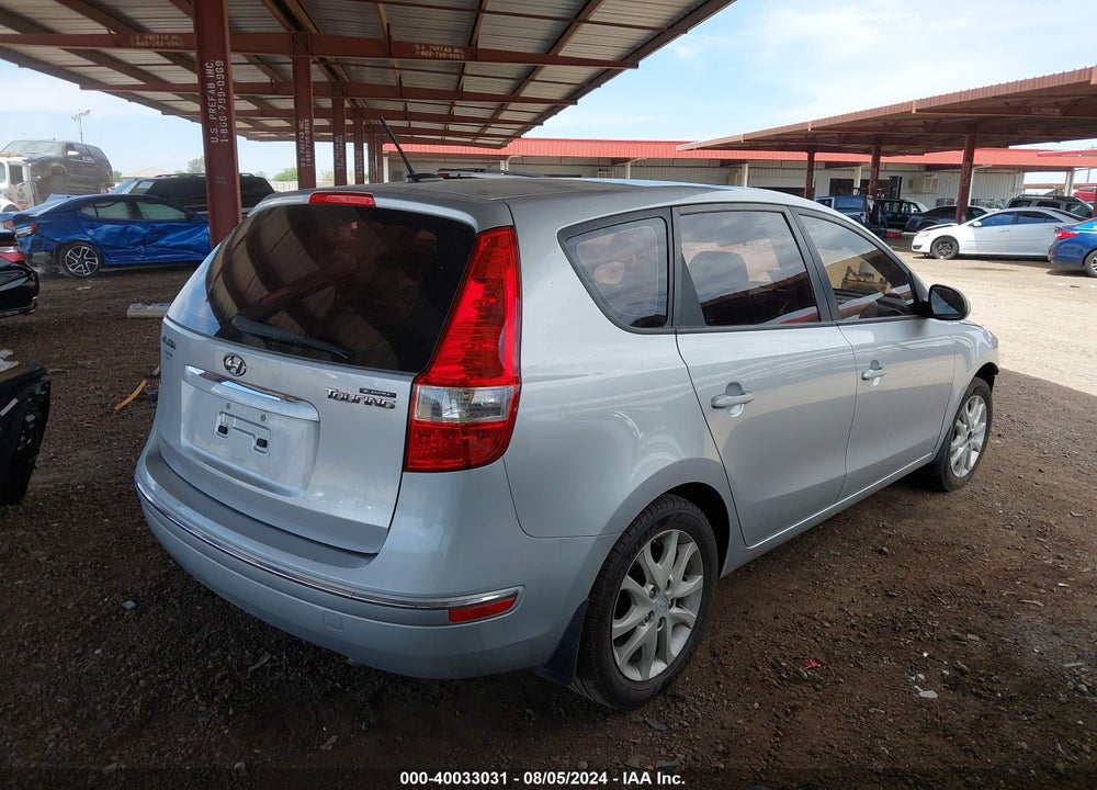 2009 HYUNDAI ELANTRA TOURING VIN: KMHDC86E49U025477