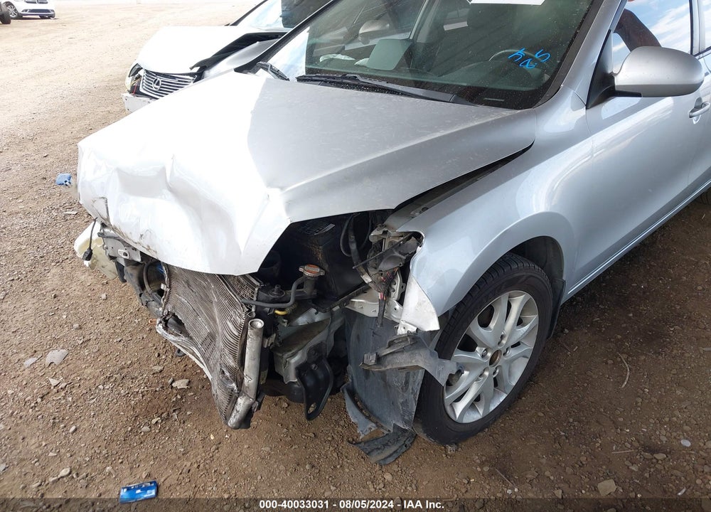 2009 HYUNDAI ELANTRA TOURING VIN: KMHDC86E49U025477