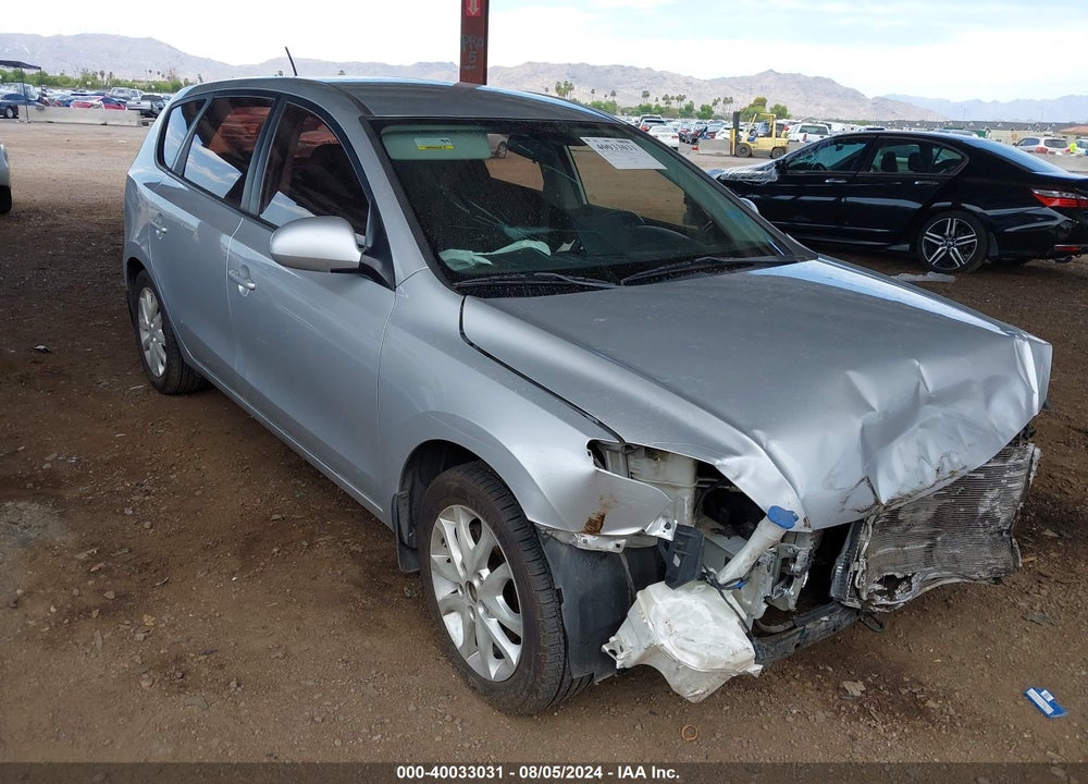 2009 HYUNDAI ELANTRA TOURING VIN: KMHDC86E49U025477