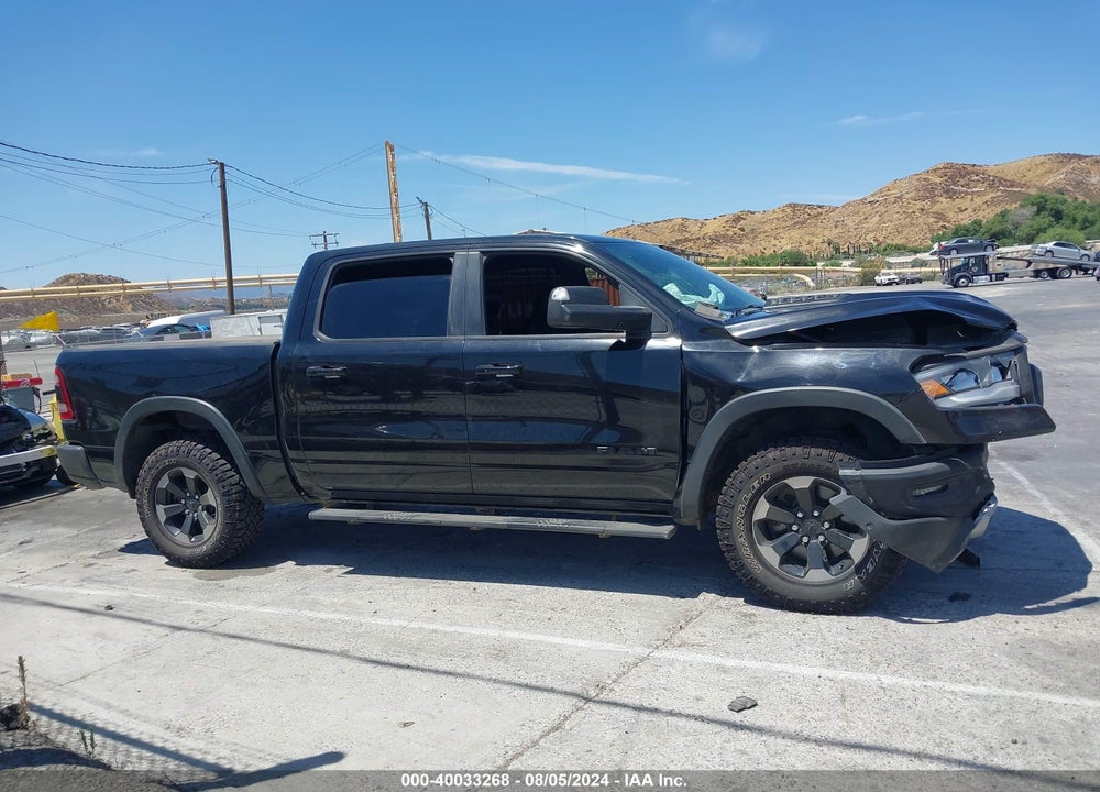 2019 RAM 1500 REBEL 4X4 5'7 BOX VIN: 1C6SRFLT6KN910174