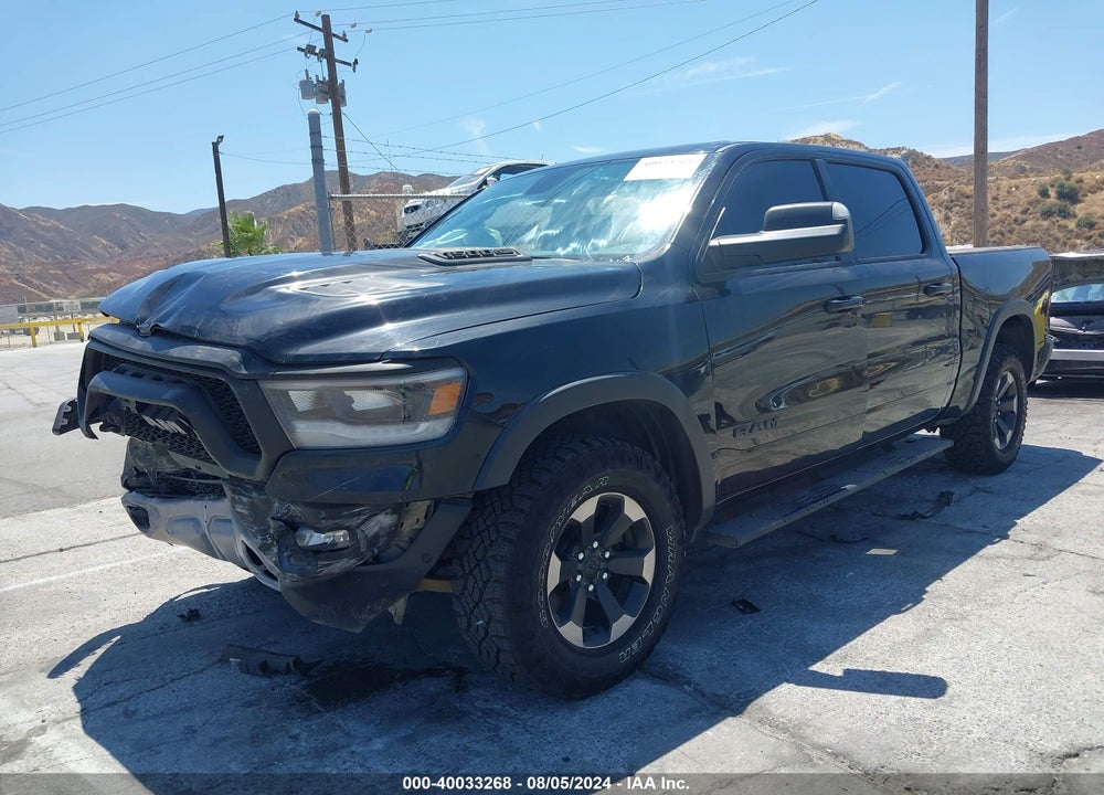 2019 RAM 1500 REBEL 4X4 5'7 BOX VIN: 1C6SRFLT6KN910174