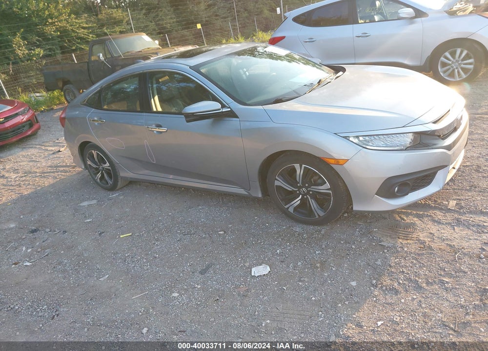 2016 HONDA CIVIC TOURING VIN: 19XFC1F90GE040979