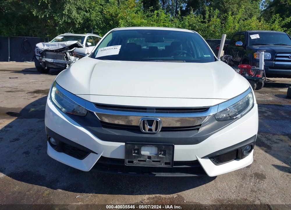 2017 HONDA CIVIC TOURING VIN: 19XFC1F98HE012476