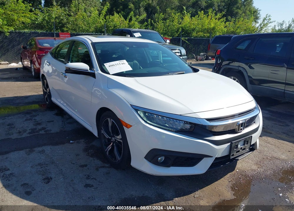 2017 HONDA CIVIC TOURING VIN: 19XFC1F98HE012476