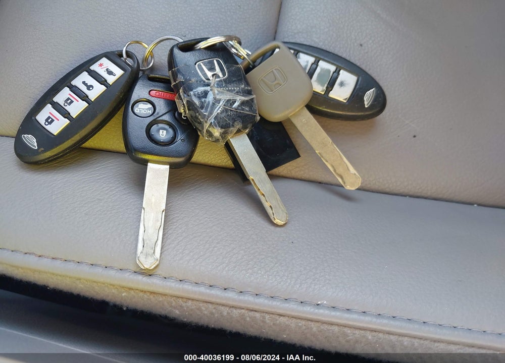 2012 HONDA PILOT EX-L VIN: 5FNYF4H5XCB023011