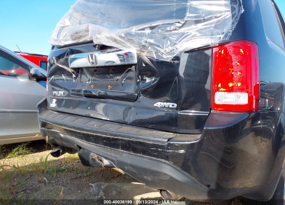 2012 HONDA PILOT EX-L VIN: 5FNYF4H5XCB023011