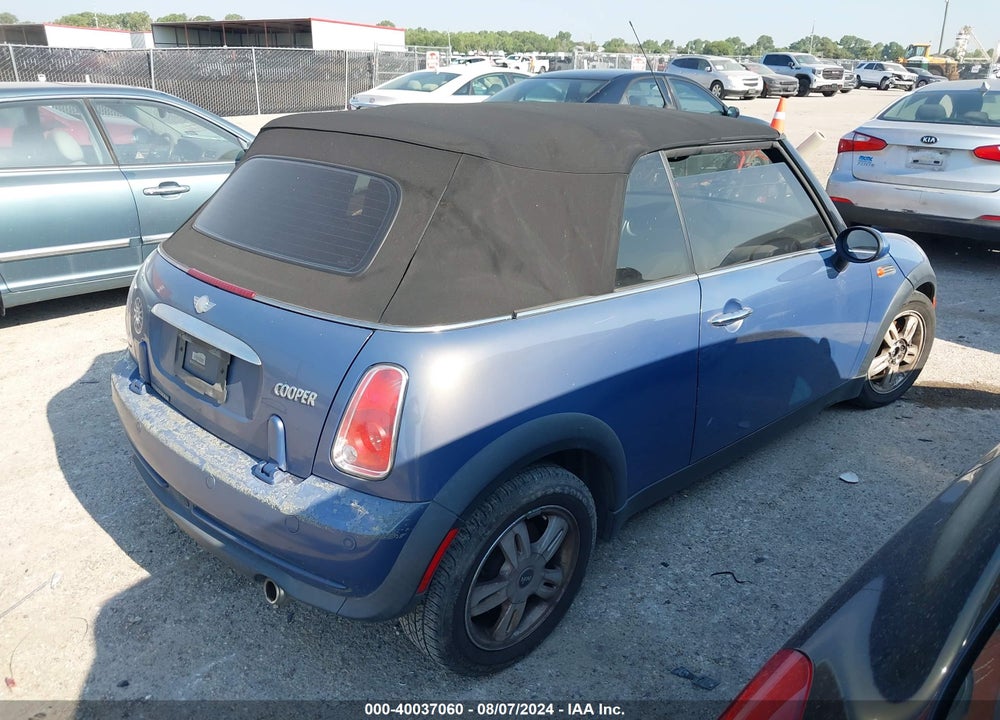 2006 MINI COOPER VIN: WMWRF33516TG16067