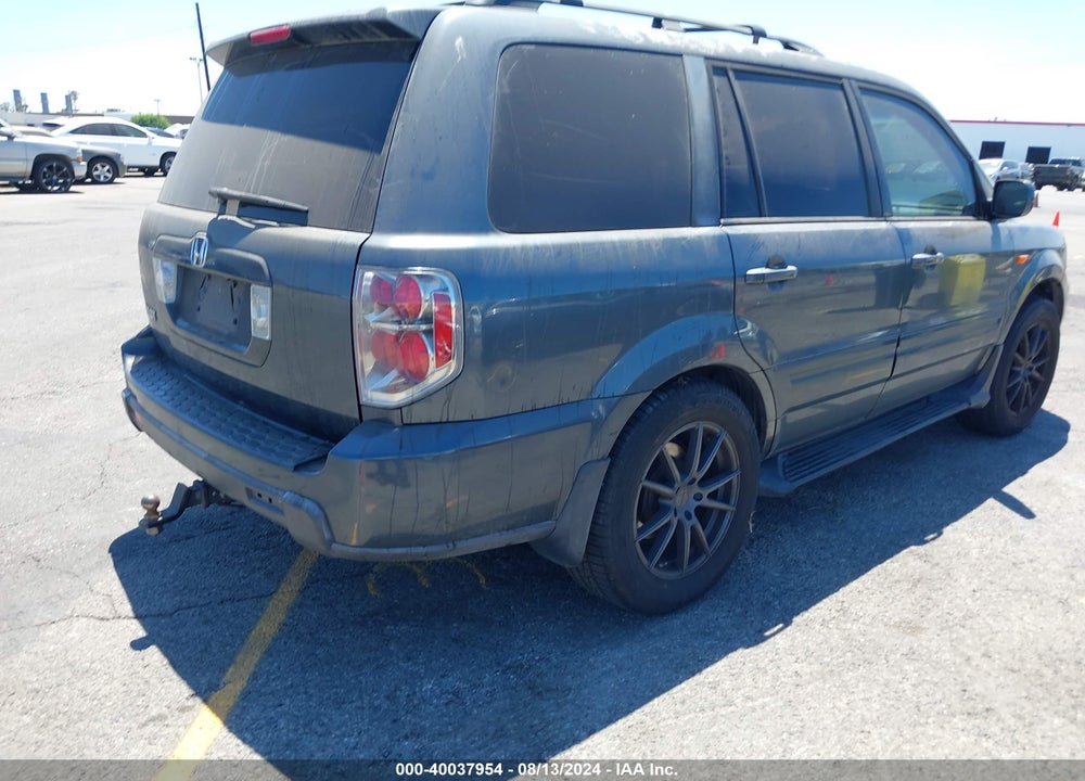 2006 HONDA PILOT EX-L VIN: 5FNYF28556B042381