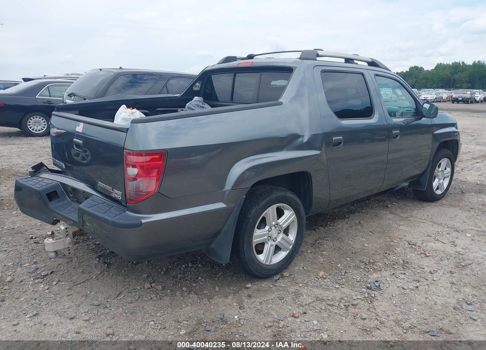 2010 HONDA RIDGELINE RTL VIN: 5FPYK1F51AB005367