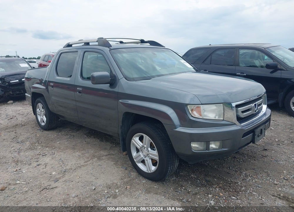 2010 HONDA RIDGELINE RTL VIN: 5FPYK1F51AB005367